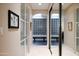 Hallway with glass block window and bench seating at 7878 E Gainey Ranch Rd # 3, Scottsdale, AZ 85258