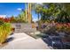 Relaxing pool and spa area with a waterfall feature and outdoor seating at 7878 E Gainey Ranch Rd # 3, Scottsdale, AZ 85258