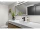 Modern bathroom with floating vanity and sleek fixtures at 8025 E Redwing Rd, Scottsdale, AZ 85250