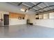 Spacious garage with overhead storage and ample space at 8025 E Redwing Rd, Scottsdale, AZ 85250