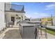 Granite countertop outdoor kitchen with bar seating at 8025 E Redwing Rd, Scottsdale, AZ 85250