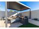 Patio furniture under a pergola at 8025 E Redwing Rd, Scottsdale, AZ 85250