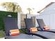 Three lounge chairs with towels sit poolside at 8025 E Redwing Rd, Scottsdale, AZ 85250