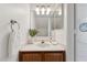 Clean bathroom with wood vanity and a large mirror at 832 W 14Th St, Tempe, AZ 85281