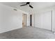 Bedroom with carpet, ceiling fan and sliding door to balcony at 832 W 14Th St, Tempe, AZ 85281