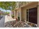 Inviting condo entryway with well-manicured landscaping and a welcoming doormat at 832 W 14Th St, Tempe, AZ 85281