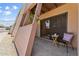 Relaxing patio area with table and chairs, adjacent to building at 832 W 14Th St, Tempe, AZ 85281