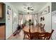 Dining room with a large wooden table and chairs at 8631 W Monte Vista Rd, Phoenix, AZ 85037