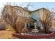 Two-story house with a fountain and landscaping in the front yard at 8631 W Monte Vista Rd, Phoenix, AZ 85037