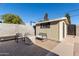 Backyard patio with seating and storage shed at 8707 N 3Rd Ave, Phoenix, AZ 85021