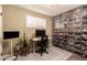 Home office with a standing desk and large shoe storage at 8707 N 3Rd Ave, Phoenix, AZ 85021