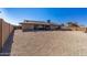 Spacious backyard with gravel and patio area at 9714 W Rodeo Ct, Sun City, AZ 85373