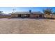 Large backyard with gravel and patio area at 9714 W Rodeo Ct, Sun City, AZ 85373