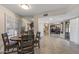 Dining area with a round table and four chairs at 9714 W Rodeo Ct, Sun City, AZ 85373