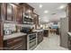 Well-equipped kitchen featuring double ovens and modern cabinetry at 9714 W Rodeo Ct, Sun City, AZ 85373