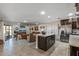 Open concept kitchen with island and stainless steel appliances at 9714 W Rodeo Ct, Sun City, AZ 85373