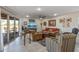 Comfortable living room with leather sofas and sliding glass doors leading to patio at 9714 W Rodeo Ct, Sun City, AZ 85373