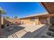 Relaxing patio area with seating and a fire pit at 9714 W Rodeo Ct, Sun City, AZ 85373