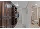 Large walk-in closet with ample shelving and drawers at 9714 W Rodeo Ct, Sun City, AZ 85373