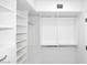 Bright white closet with ample shelving at 9789 E Cinnabar Ave, Scottsdale, AZ 85258