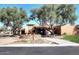 Attractive community center with landscaping and a circular driveway at 9789 E Cinnabar Ave, Scottsdale, AZ 85258