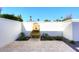 Private patio with fountain and seating area at 9789 E Cinnabar Ave, Scottsdale, AZ 85258