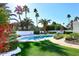 Sparkling pool with grassy backyard at 9789 E Cinnabar Ave, Scottsdale, AZ 85258