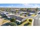 Aerial view of community, highlighting a home and its surroundings at 9802 N Balboa Dr, Sun City, AZ 85351