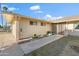 Home's entrance with decorative gate at 9802 N Balboa Dr, Sun City, AZ 85351