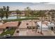 Aerial view of home on golf course with pool and clubhouse at 10009 E Michigan Ave, Sun Lakes, AZ 85248