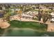 Aerial view of home on golf course with water features at 10009 E Michigan Ave, Sun Lakes, AZ 85248