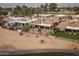 Aerial view of single-story home with a tile roof and attached garage at 10009 E Michigan Ave, Sun Lakes, AZ 85248