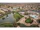 Aerial view of community with golf course and pool at 10009 E Michigan Ave, Sun Lakes, AZ 85248