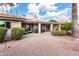 Backyard features a patio, mature landscaping and a golf course view at 10009 E Michigan Ave, Sun Lakes, AZ 85248