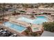 Resort-style pool and lap lanes with surrounding lounge area at 10009 E Michigan Ave, Sun Lakes, AZ 85248