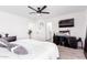 Bright bedroom with a king-size bed and en-suite bathroom at 11020 W Lane Ave, Glendale, AZ 85307