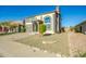 Two-story house with a brown garage door and landscaped yard at 11020 W Lane Ave, Glendale, AZ 85307