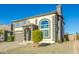 Two-story house with a brown garage door and landscaped yard at 11020 W Lane Ave, Glendale, AZ 85307