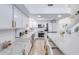 Clean, modern kitchen with white cabinets and marble countertops at 11020 W Lane Ave, Glendale, AZ 85307