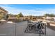 Spacious backyard patio with fire pit and seating area, perfect for entertaining at 1106 E Circle Mountain Rd, New River, AZ 85087