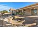 Large patio with fire pit and seating area at 1106 E Circle Mountain Rd, New River, AZ 85087