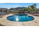 Stunning kidney-shaped pool with patio furniture at 1106 E Circle Mountain Rd, New River, AZ 85087