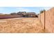 Large backyard with block wall and open space at 11386 W Buchanan St, Avondale, AZ 85323