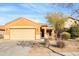 Single-story house with attached garage and desert landscaping at 11386 W Buchanan St, Avondale, AZ 85323