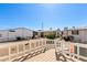 View of backyard with gravel landscaping and surrounding homes at 11596 W Sierra Dawn Blvd # 109, Surprise, AZ 85378