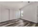 Bedroom with vinyl plank flooring and a large closet at 11596 W Sierra Dawn Blvd # 109, Surprise, AZ 85378