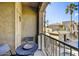 Private balcony with patio furniture, offering partial pool view at 12050 N Panorama Dr # 208, Fountain Hills, AZ 85268