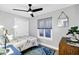 Cozy bedroom with ceiling fan and window at 1233 E Monte Vista Rd, Phoenix, AZ 85006