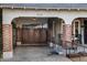 Carport with brick pillars and a metal gate at 1233 E Monte Vista Rd, Phoenix, AZ 85006