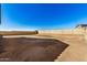 Large backyard with block wall and gravel at 1306 E Cecil Ct, Casa Grande, AZ 85122